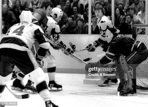 Goalie Joe Daley Of The Winninpeg Jets Follows The Puck As His News