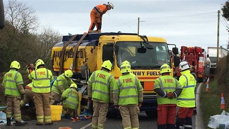 Oil Tanker Overturns After Hitting Traffic Lights Bbc News