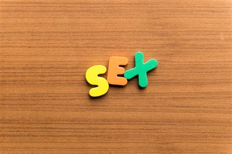 Premium Photo High Angle View Of Colorful Sex Text On Wooden Table