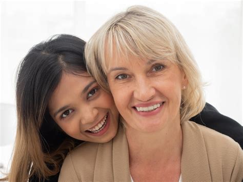 Premium Photo Portrait Of Asian Teen Daughter Is Hugging Her Adopted