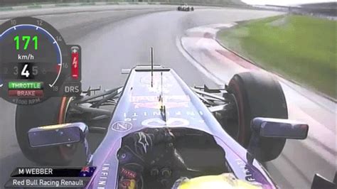 Here's F1 Driver Mark Webber Giving Teammate Sebastian Vettel The Finger