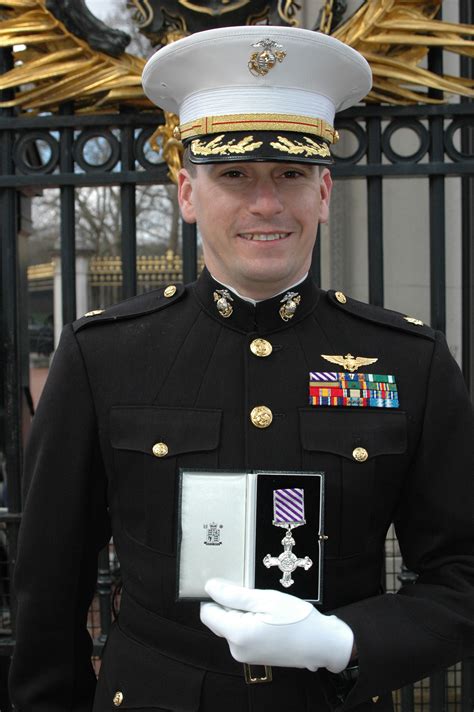 Major receives UK's Distinguished Flying Cross at Buckingham Palace ...