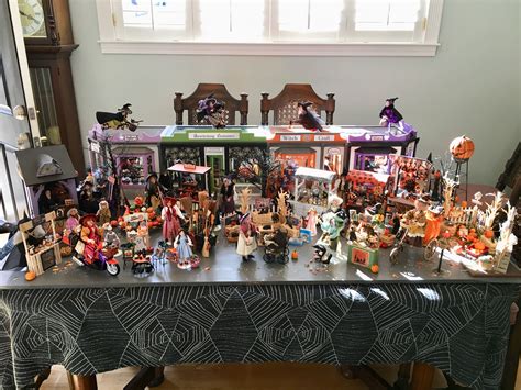 A Table Topped With Lots Of Halloween Figurines