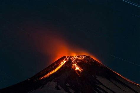 Lava Dribbling Down The Sides Of Villarrica S Crater Glows A Fiery