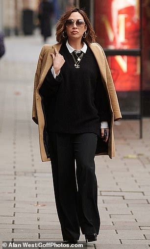 Myleene Klass Looks Chic In An Oversized Sweater And Flared Trousers Daily Mail Online