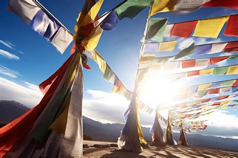 Premium Ai Image Tibetan Prayer Flags Fluttering In The Wind