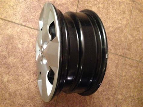 Purchase 16 Inch Rims With Hub Caps And Lug Nuts Off Of Toyota RAV 4