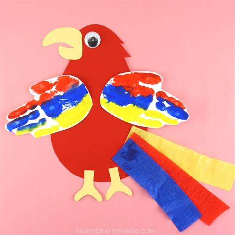 Pretty Handprint Parrot Craft - I Heart Crafty Things