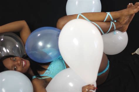 Brunette Chick Kassey Starr Posing With A Bunch Of White Balloons Photos