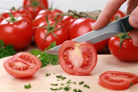 Premium Photo Close Up Of Red Chili Peppers On Cutting Board