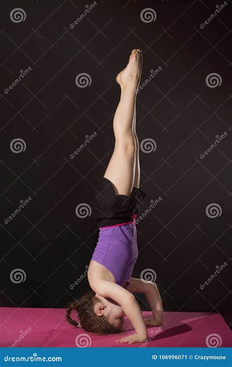 Little Caucasian Girl Practing Headstand Pose Stock Image Image Of Power Sporter 106996071