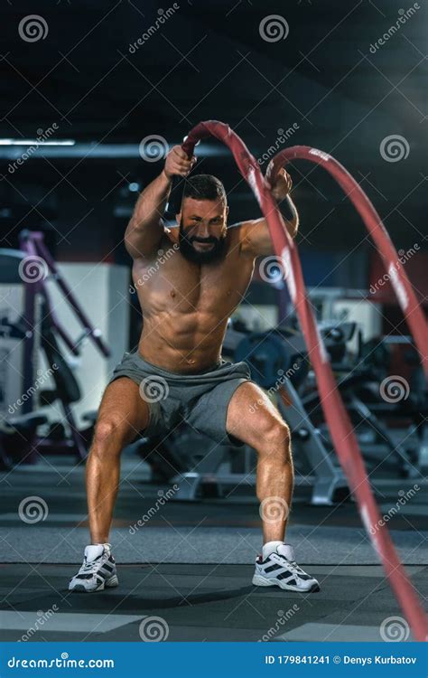 Bodybuilder Pulling Rope Stock Image Image Of Activity