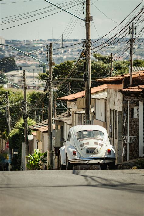 Volkswagen Near House With Gate · Free Stock Photo