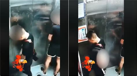 Video Two Men Pee Inside An Elevator Woman Tries To Block The Camera