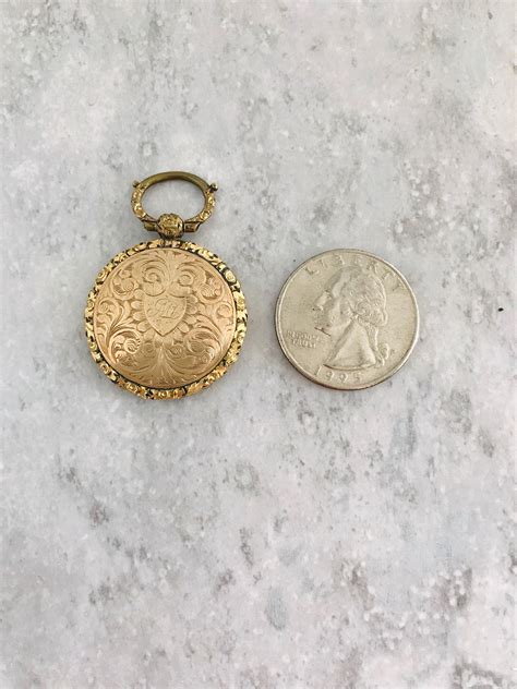 Gold Shell Memorial Locket Heavily Engraved And Embossed Locket