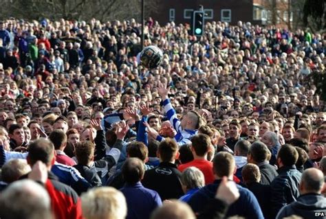 Up'ards lead Ashbourne's famous Shrovetide Football game. — gunsandammo