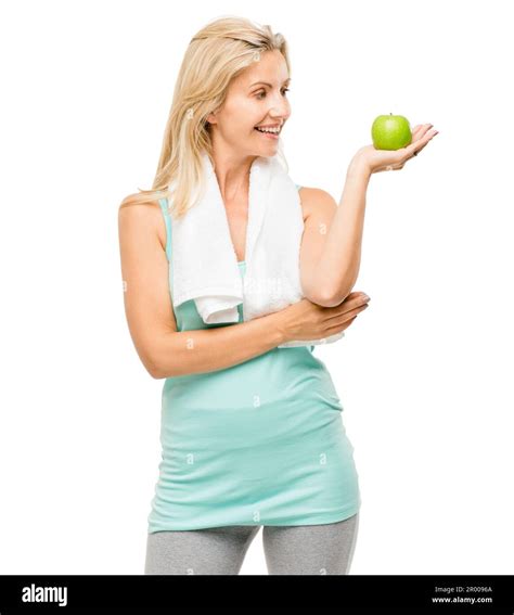 Your Health Matters Most A Mature Woman Eating An Apple Against A