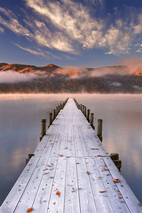 Jetty In Lake Chuzenji Japan At Sunrise In Autumn Stock Image Image