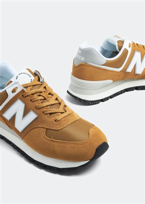 New Balance 574 sneakers for Men - Orange in UAE | Level Shoes