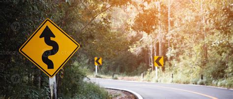 Traffic Sign Dangerous Curve On The Road Stock Photo At Vecteezy