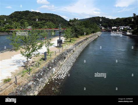 A photo shows Uji River near Byōdō in a Japanese Buddhist temple in