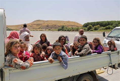 Photo gallery: Yazidi refugees flee chaos in Iraq - National | Globalnews.ca