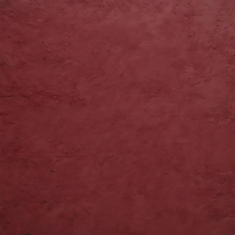 Premium Photo Solid Maroon Concrete Textured Wall