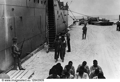 WWII: BATTLE OF MIDWAY WWII: BATTLE OF MIDWAY, 1942. Japanese prisoners ...