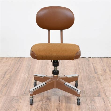 This Retro Office Chair Is Featured In An Industrial Brown And