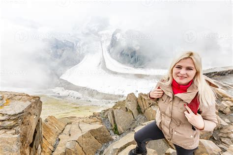 Rear view of a woman with backpack looking at the view Female hiker ...