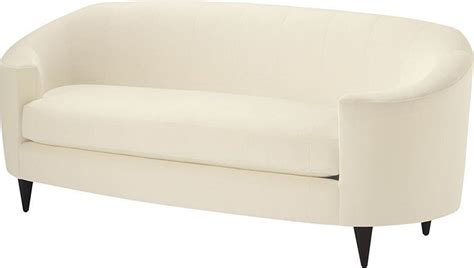 An Oval Sofa With Deeply Curled Arms Notched Bench Seat Tapered