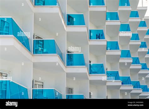 Modern White Architecture With Blue Glass Generating A Geometric