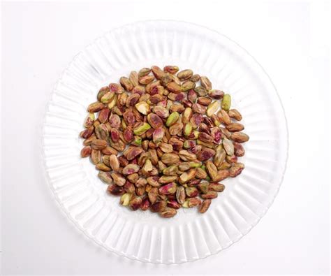 Premium Photo Pistachio Nuts Many Pistachios Isolated On White