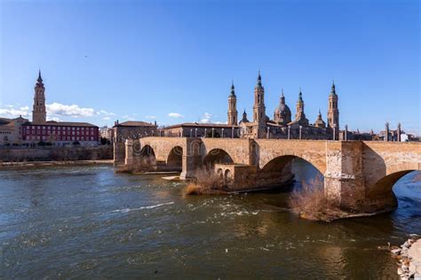 Puente De Piedra In Spanish Over The River Ebro In Zaragoza Aragon