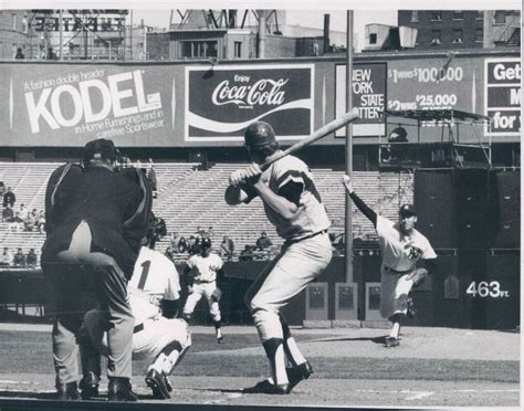 An Old Black And White Photo Of A Baseball Game