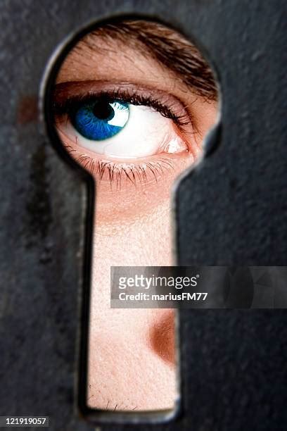 I See You Man Looking Through Keyhole High Res Stock Photo Getty Images