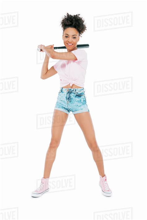 Beautiful African American Girl Holding Baseball Bat And Smiling At