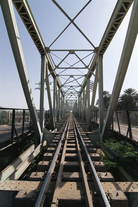 Train Track Bridge during Cloudy Skies · Free Stock Photo