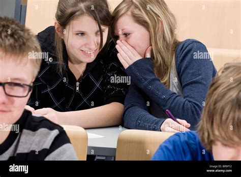 Students Whispering In Class