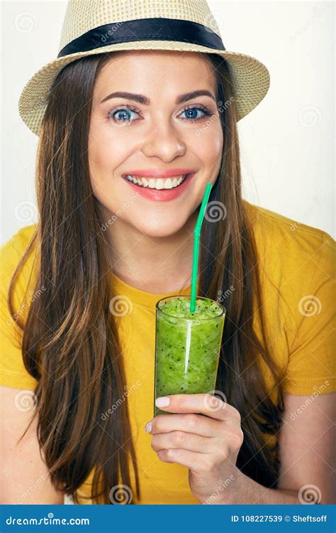 Face Portrait Of Smiling Woman Holding Green Smoothie Stock Image