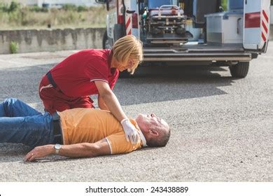 Rescue Team Providing First Aid Stock Photo Shutterstock