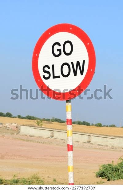 Red Sign Warning Symbol On Highway Stock Photo 2277192739 | Shutterstock