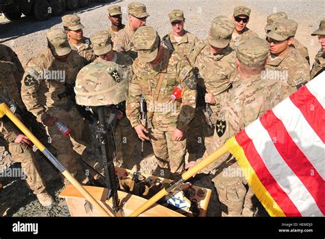 Soldiers Of With 1st Battalion 38th Infantry Regiment Gather Around