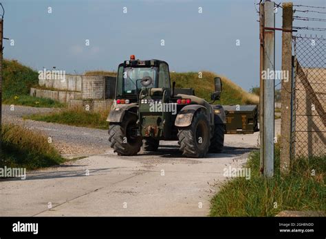 British Army Jcb Fork Lift Truck Moving Boxed Weapons In Preparation