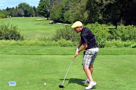 Best Left Handed Golf Clubs Tending The Flag