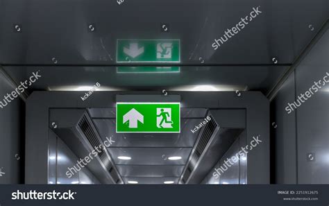 Green Emergency Exit Sign Showing Way Stock Photo 2251912675 | Shutterstock