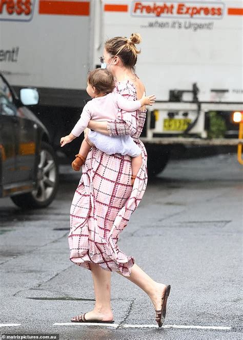 Pregnant Jesinta Franklin Cradles Daughter Tullulah As Buddy Sweetly Kisses Her On The Cheek