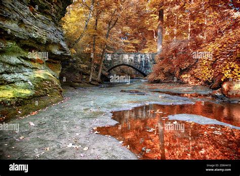 Old Stone Bridge Over A Stream Stock Photo Alamy