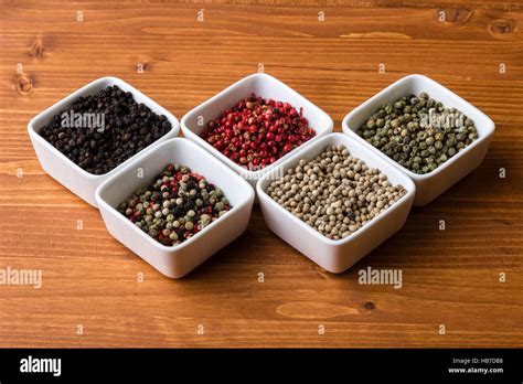 Spices In White Square Bowls Stock Photo Alamy