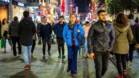 Woman Standing Alone Among Crowd Of People In Istanbul City Life